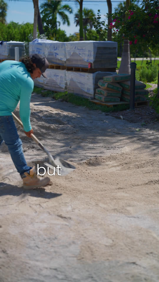 Team member preparing a paved surface