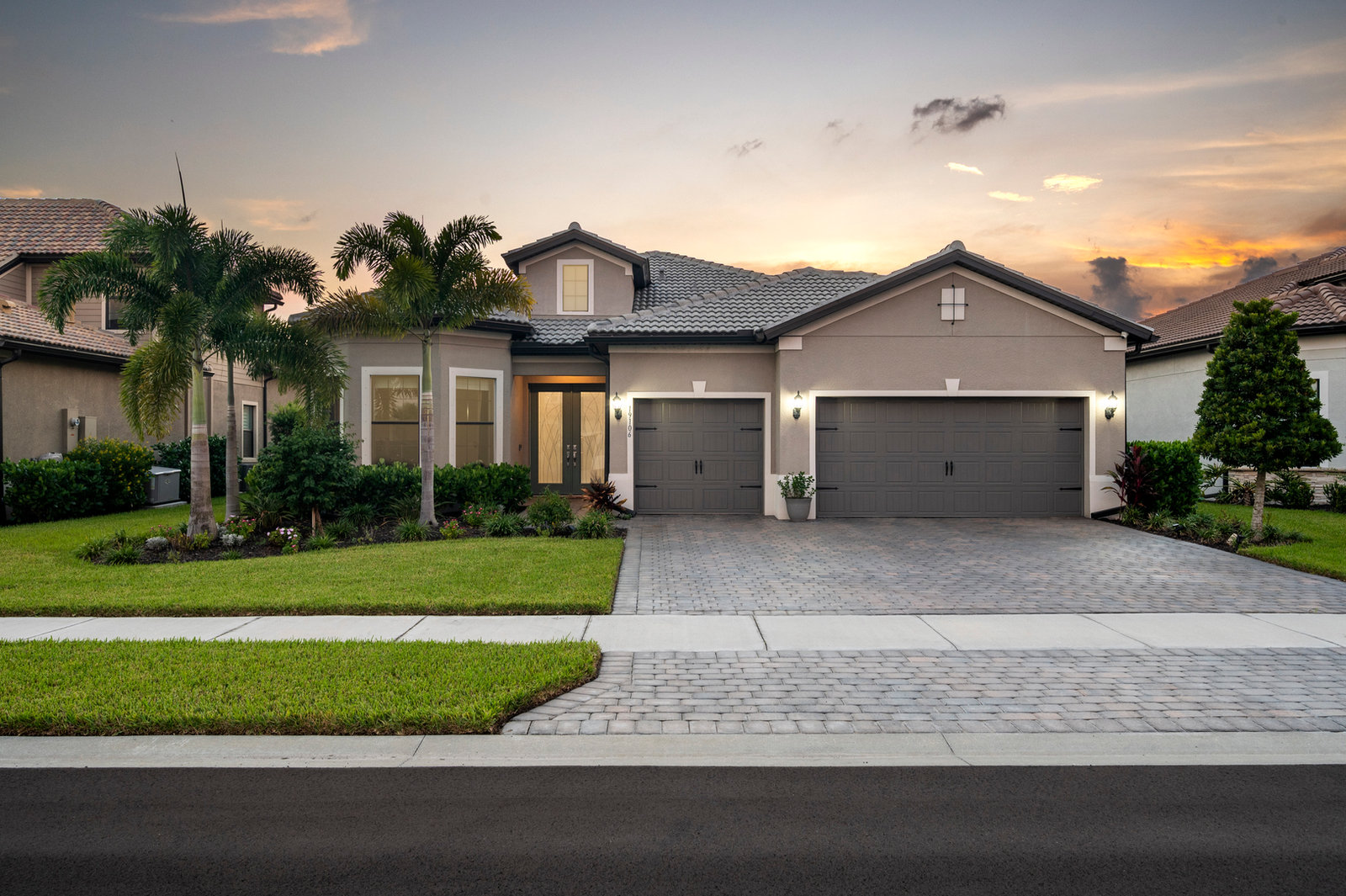 A home glowing at dusk