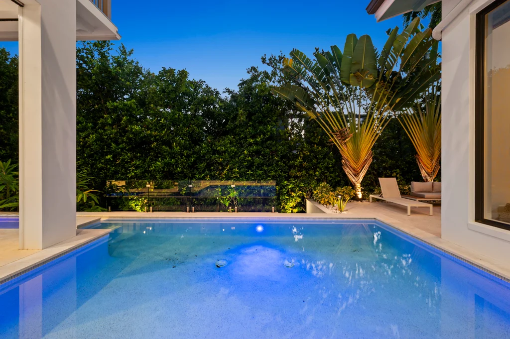 Illuminated swimming pool and outdoor living space